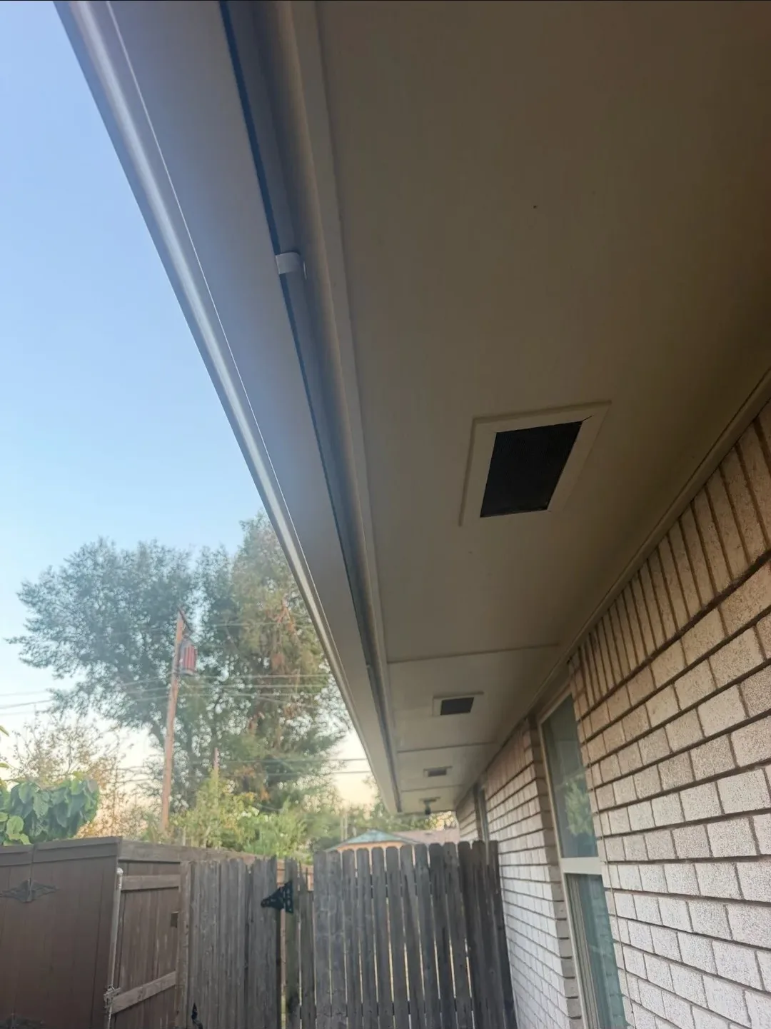 Seamless gutter along a fresh soffit line